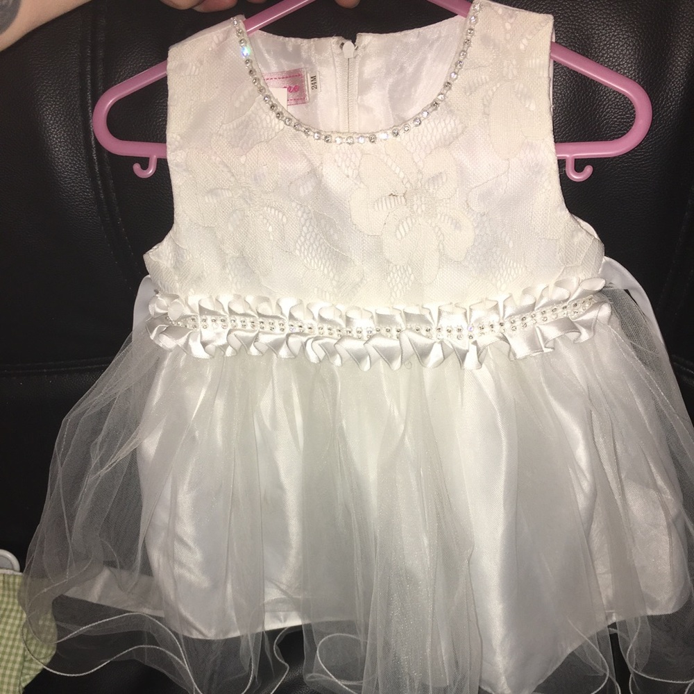 White Embroidered dress by S square.